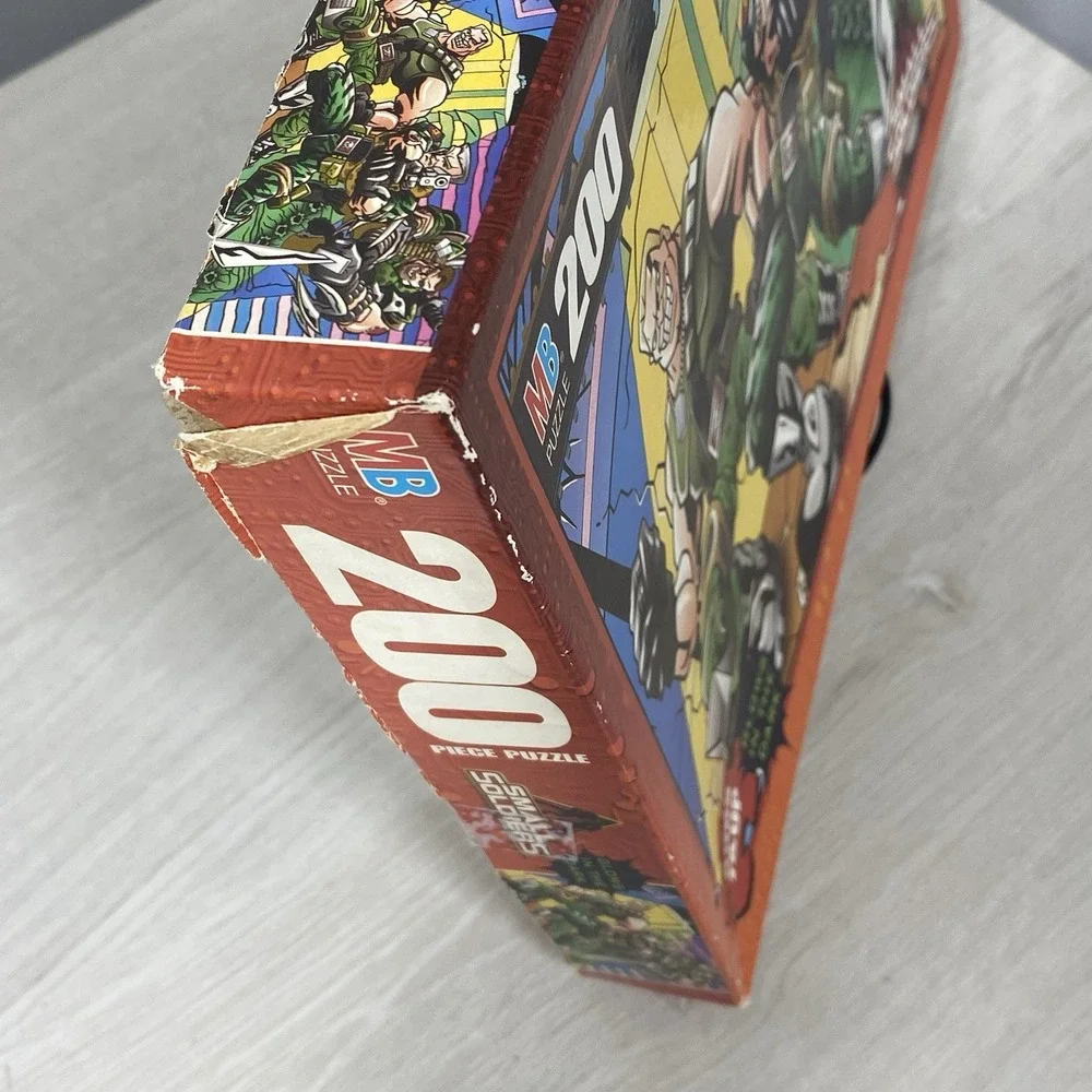 Lot of Two Vintage 1998 Milton Bradley Small Soldiers Glow Dark 200pc Puzzles